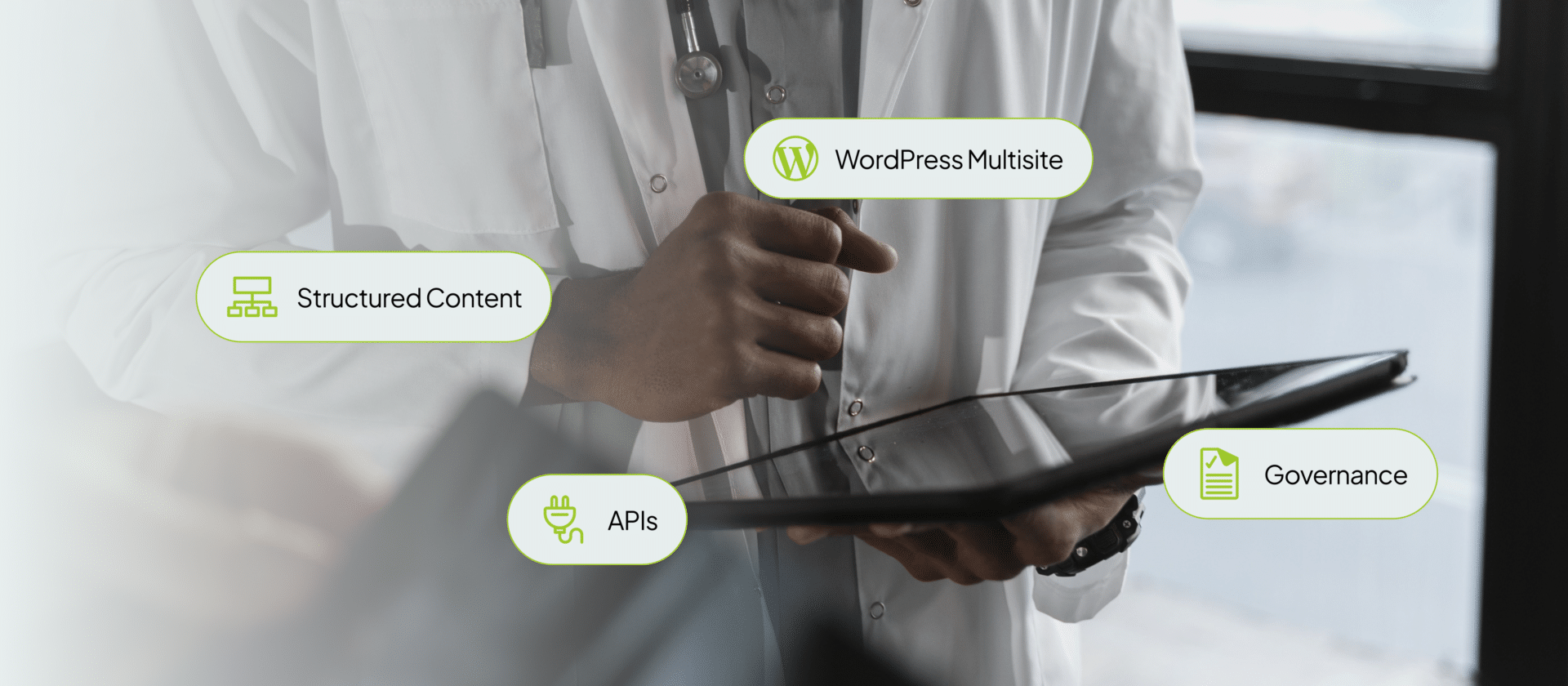 A doctor accessing online portals via a portable device